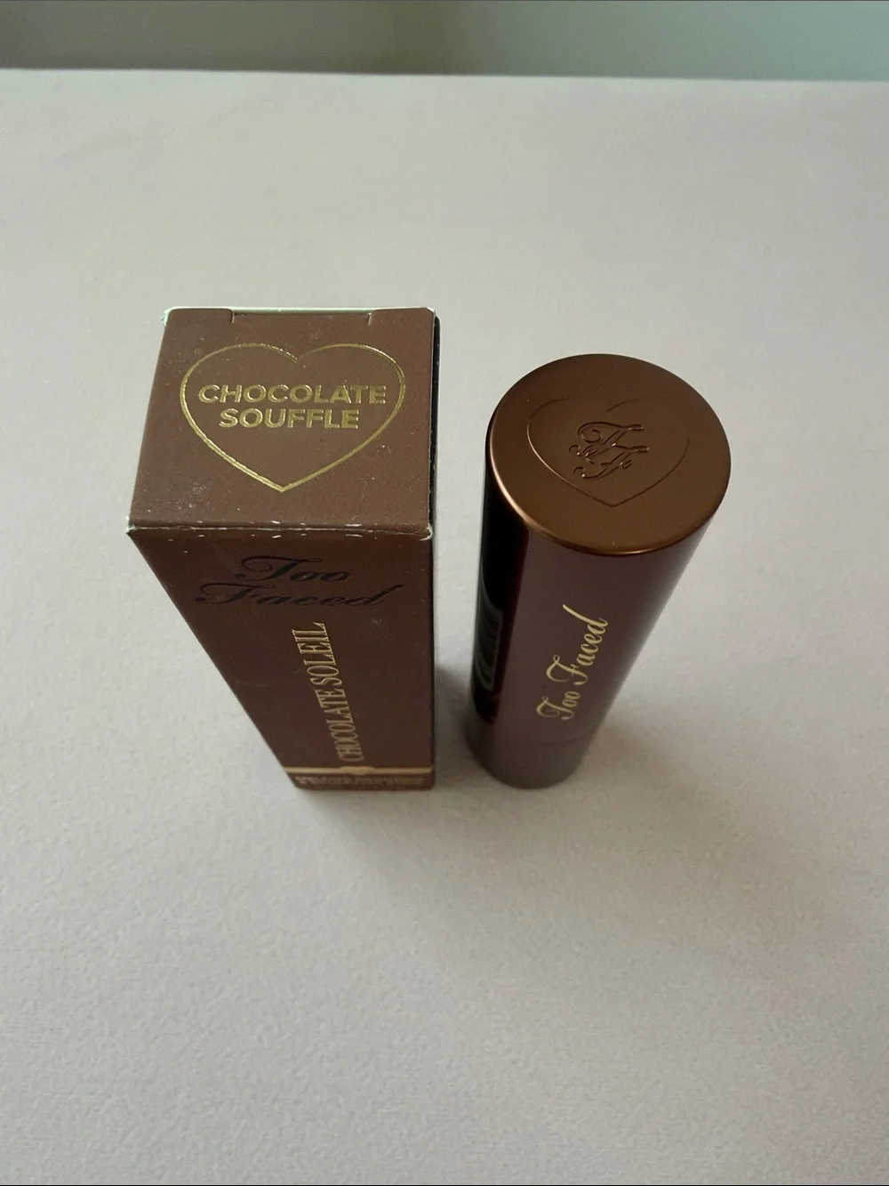 TOO FACED MELTING BRONZING AND SCULPTING STICK - CHOCOLATE SOUFFLÉ